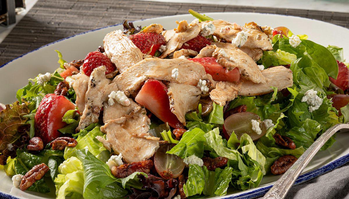 Brio's Strawberry Balsamic Chicken Salad in a plate