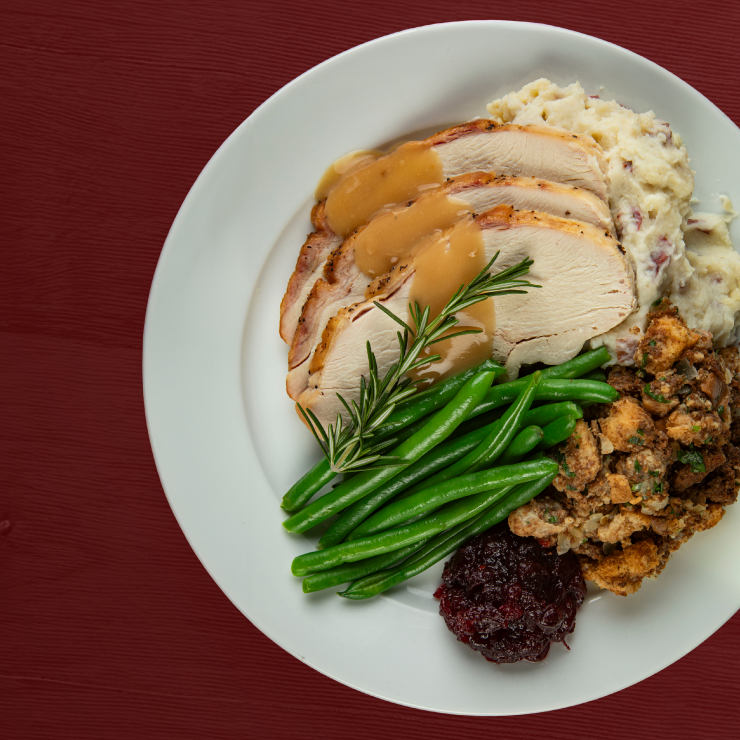 Thanksgiving turkey from Brio with fresh greens and stuffing